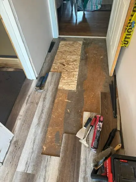 Subfloor Repair and Laminate Flooring Restoration in Hamilton — flooring repair